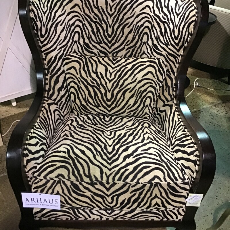This gorgeous zebra print chair from Arhaus features a flippable seat cushion, black frame, leather back and lots of curves! It comes with a lumbar pillow. This chair is from the Arhaus Camden Collection.
Dimensions are 29 in x 36 in x 41 in