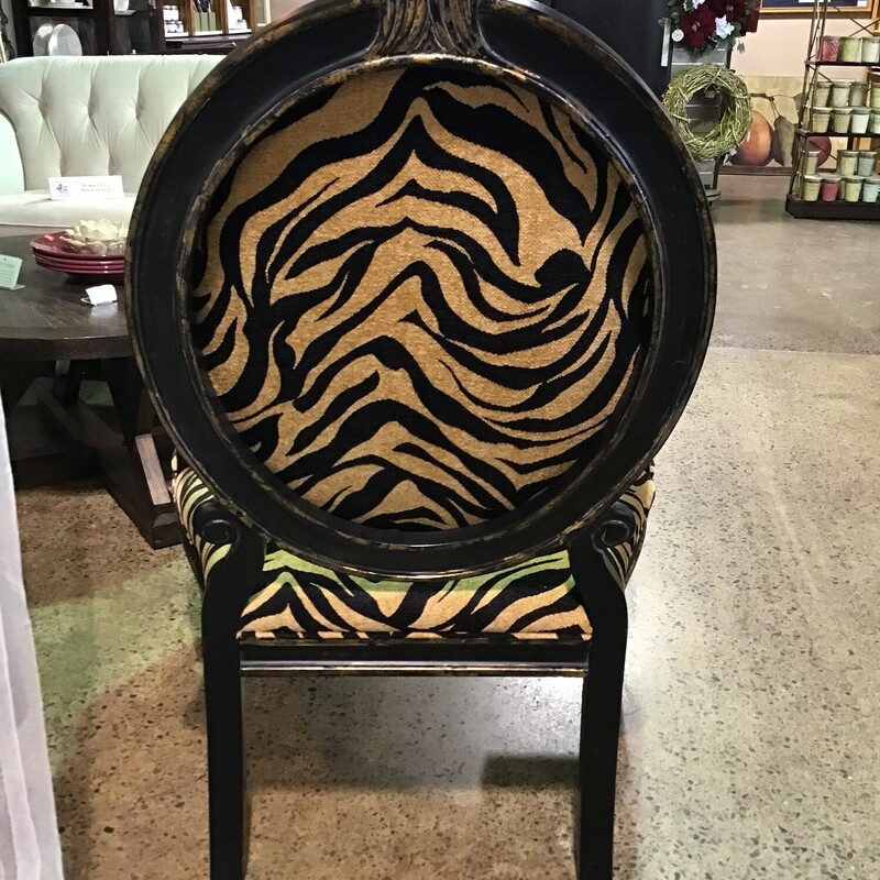 This chair is gorgeous & very comfortable! The frame is black and heavily distressed and the upholstery is animal print! What a beautiful conversational piece for any room!
Dimensions are 32 in x 32 in x 43 in