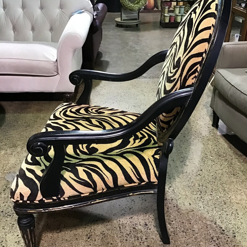 This chair is gorgeous & very comfortable! The frame is black and heavily distressed and the upholstery is animal print! What a beautiful conversational piece for any room!<br />
Dimensions are 32 in x 32 in x 43 in