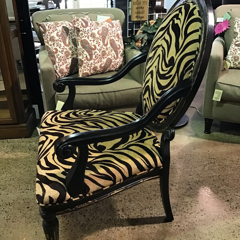 This chair is gorgeous & very comfortable! The frame is black and heavily distressed and the upholstery is animal print! What a beautiful conversational piece for any room!<br />
Dimensions are 32 in x 32 in x 43 in