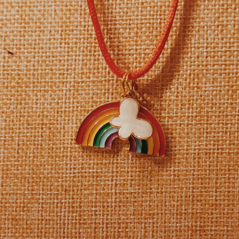 This adorable rainbow necklace is on a 17 inch cord with a 2 inch extender!