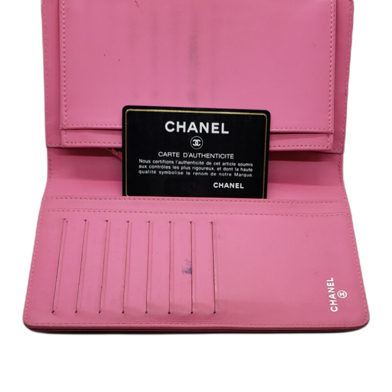 Chanel<br />
<br />
Wallet Large Bi-Fold<br />
<br />
Caviar Leather Pink<br />
<br />
2012-2013<br />
<br />
Condition: Good, Oursie has some faint wear. Interior  has Scuff/Marks from Cards on leather.