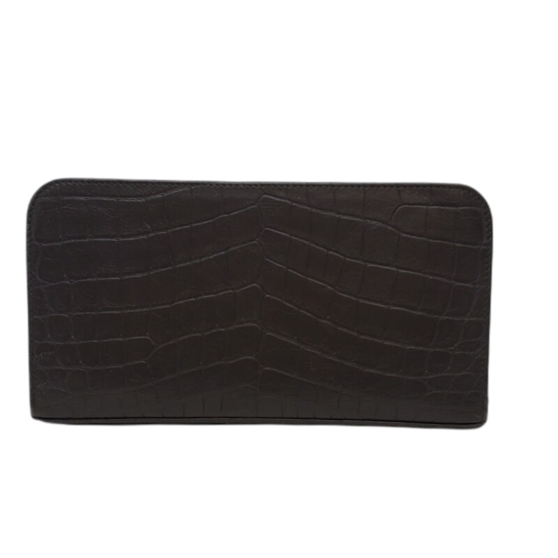 Saint Laurent<br />
<br />
YSL Embossed Long Wallet<br />
<br />
Oversized for extra card holders<br />
<br />
Condition: Excellent. A Few Marks from zipper. Corners