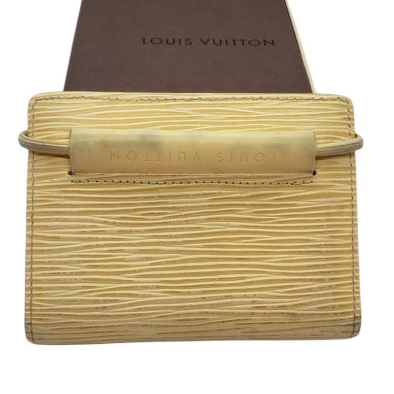 Louis Vuitton<br />
<br />
Card Holder: Elastic<br />
<br />
Epi Leather Cream<br />
<br />
Condition: Good. Wear on Epi Leather. Wear On elastic. Color Transfer on front logo area.<br />
<br />
Comes With Box