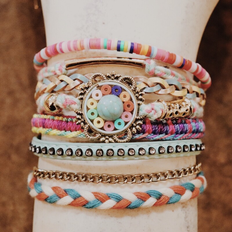 This is a cute way to stack alot of bracelets but have them all in one bracelet. Each part of the bracelet is different. Locking Clasp.