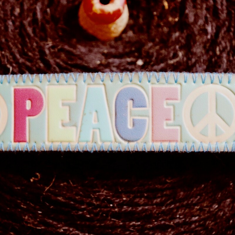 This Kelli Hawk Designs peace bracelet measures 8 inches and has the word Peace on it!