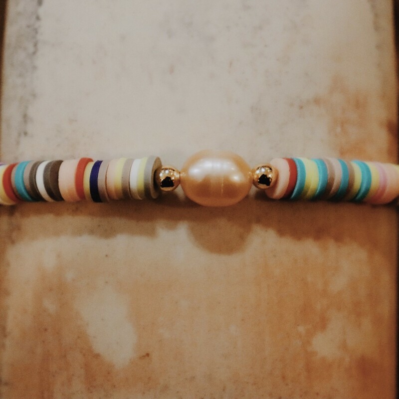 These Kelli Hawk Designs bracelets are stretchy with a pearl center!<br />
Please select your color choice!