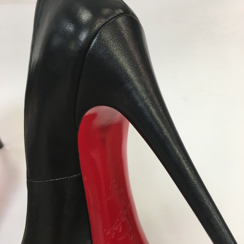 Christian Louboutin Platform open toe pumps.<br />
Size 37 (equivalent to a size 7)<br />
As Is condition: some scuffing throughout the outside of the shoes. Wear on the sole portion and slight wear on the interior (mostly near the toe portion). Please refer to photos.<br />
If you need additional information or photos, please contact the store!