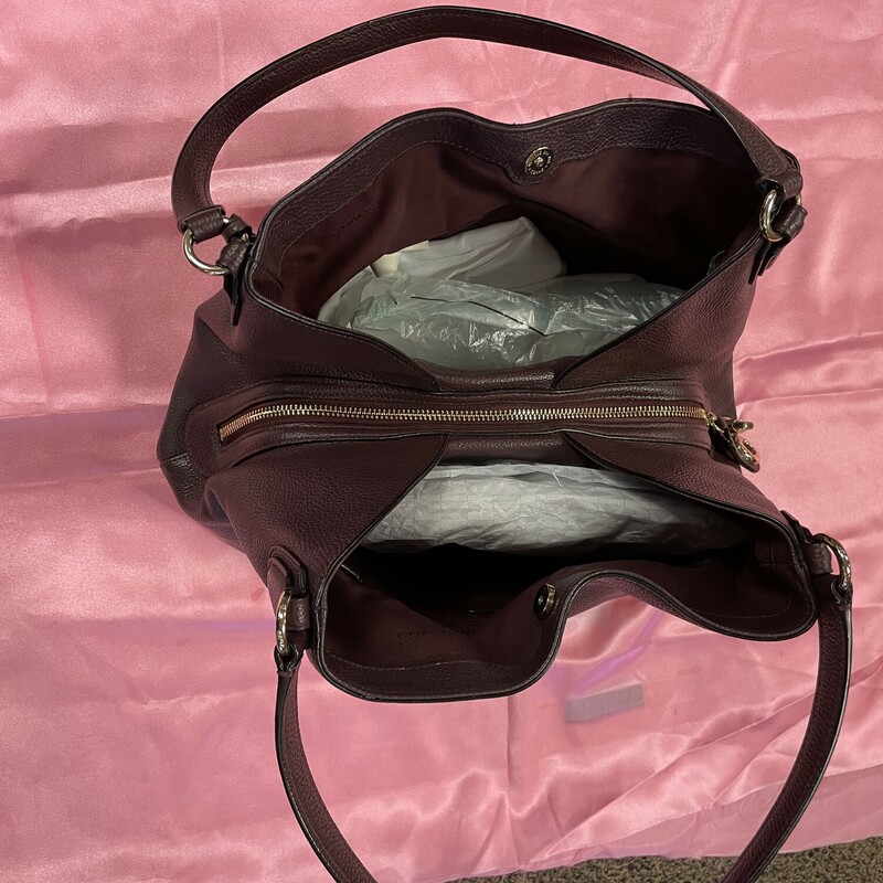 Like-New Coach Sachel Bag, Raisin, Size: L  This bag has 3 compartments when open.  Center zip with side pockets and a dust bag.  In very good condition.