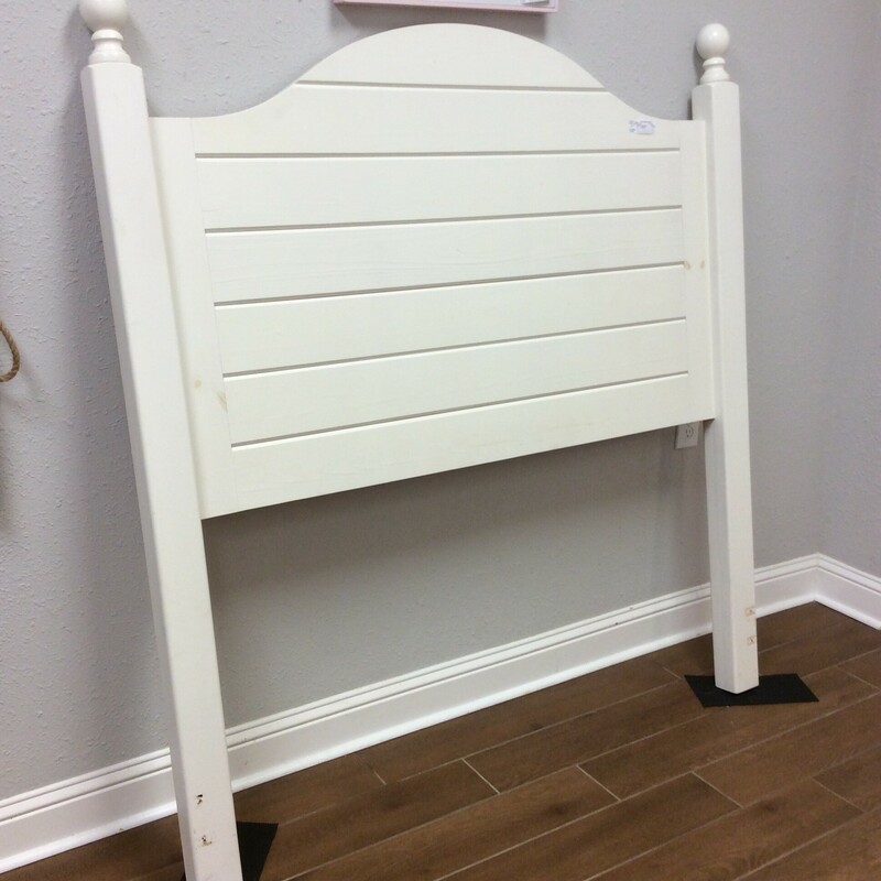 This queen-sized headboard has been painted off-white. No rails included.