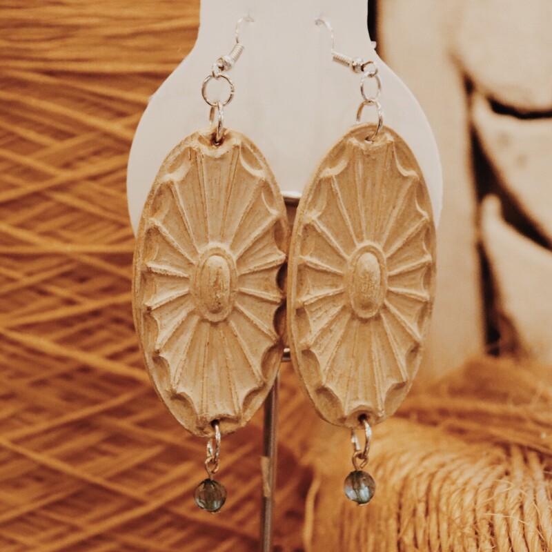 These handmade wooden earrings measure about 3.75 inches long. Please select the color bead you would like.