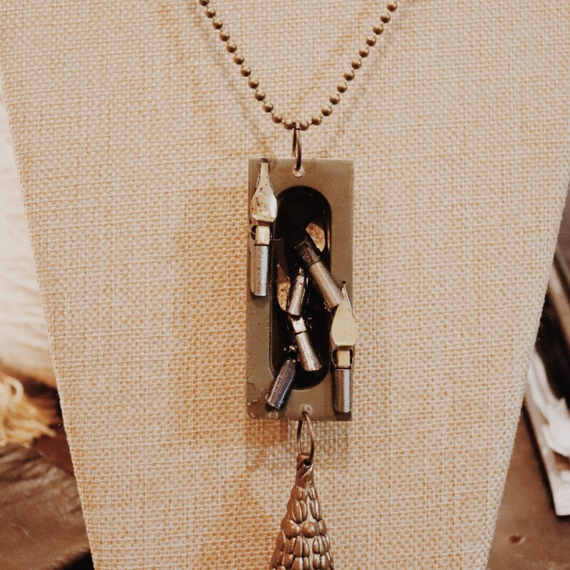This hand crafted necklace hangs on a 31 inch chain!