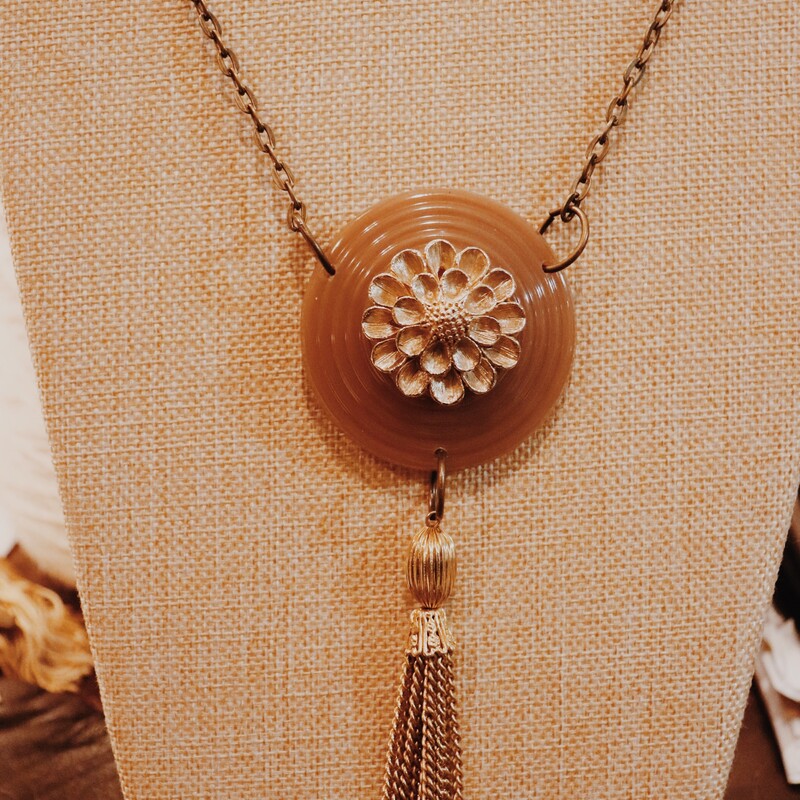 This hand crafted necklace hangs on a 30 inch chain!
