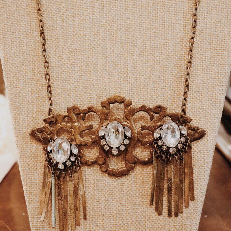 This fabulous handmade necklace is on a 22 inch chain and has a vintage handle as the centerpiece!