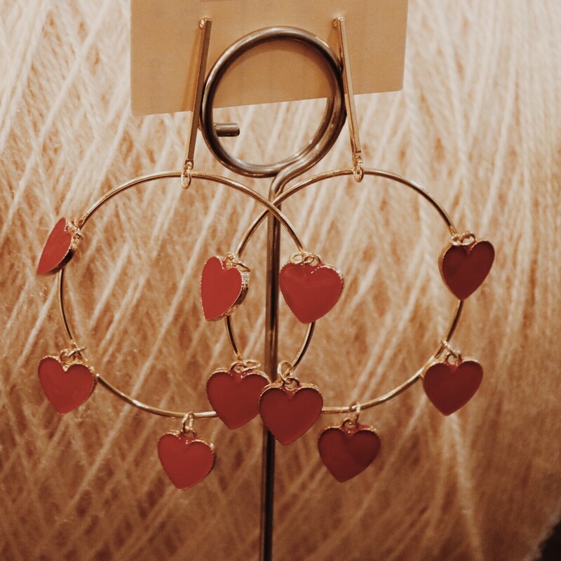 These unique heart earrings are perfect for Valentine's Day or any time of year! They measure 3.5 inches long.
