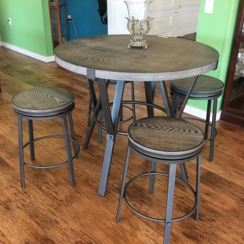 Beautiful round bar height table with four barstools with a rustic grey top and a black base. It is made by Steve Silvers. The barstools swivel and the diameter  of the table is 42\". Sweet set for a small area!