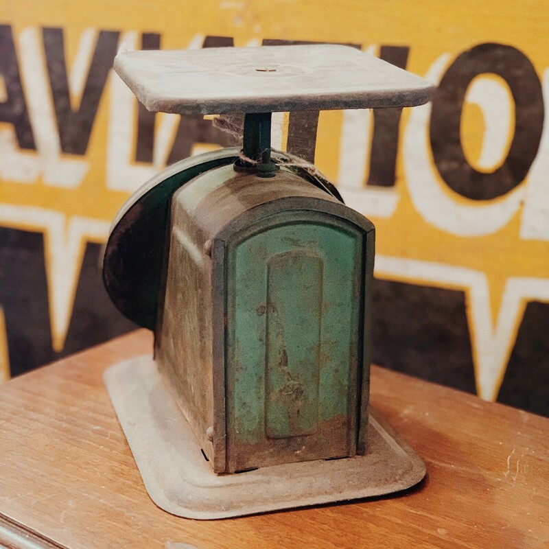 This vintage scale measures 8.5 inches tall. These old scales are perfect to add character to your decor!