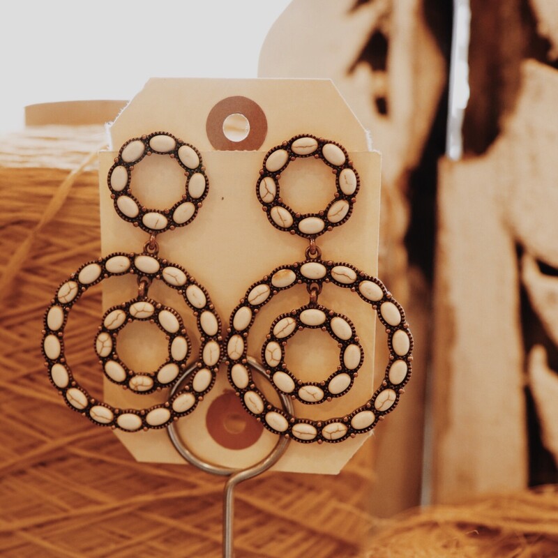The circles on this pair of earrings make them so groovy, while the copper/ivory color combo adds a rustic chic element! Perfect for everyone!
2.75 Inches Long