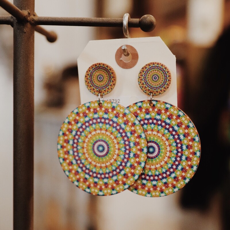 These circle aztec earrings are wooden and lightweight! 3.25 inches long