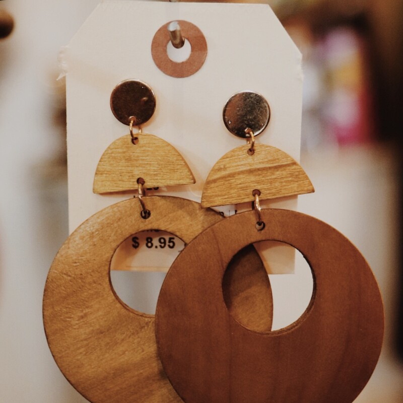 These earring are light weight with gold accent at the post. They are made from wood. 3 1/2 long