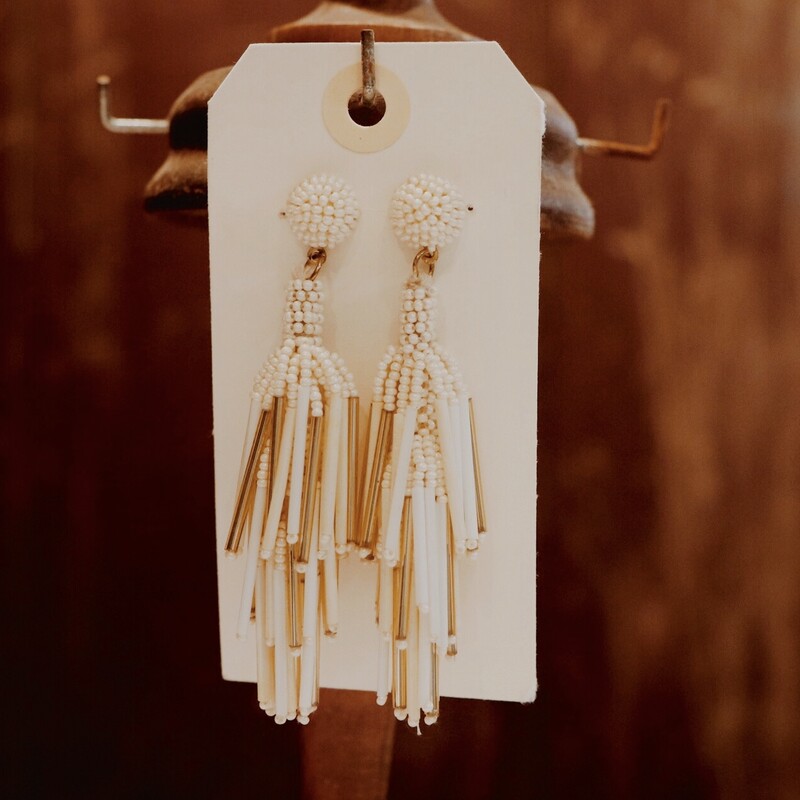 These cream colored and gold earrings are absolutely elegant! They hang just right and are not too heavy! They measure 3.75 inches long.