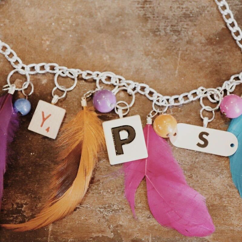 This fabulous necklace spells out gypsy in game piece and is on a 28 inch chain!