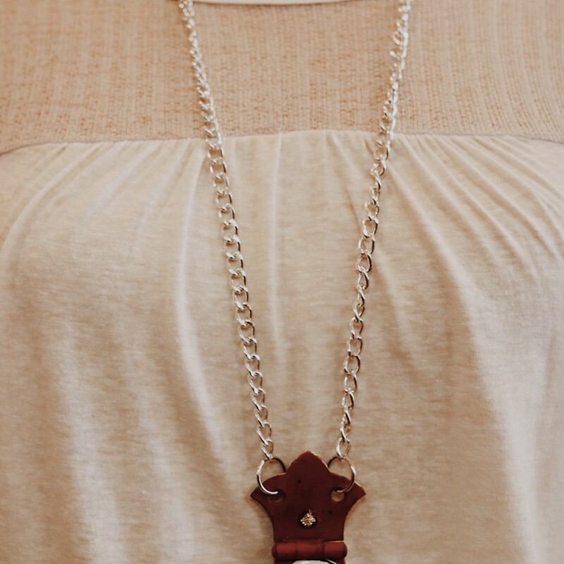 This adorable, handmade necklace is on a 36 inch chain!