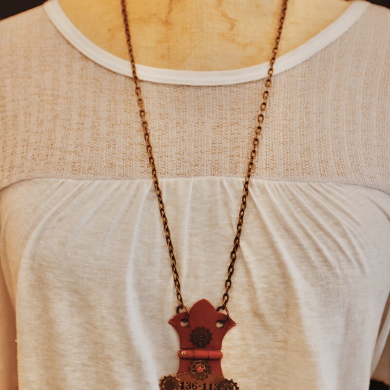 This adorable, handmade necklace is on a 31 inch chain!