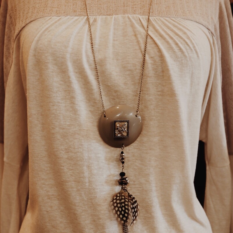 This beautiful, handmade necklace is on a 34 inch chain!
