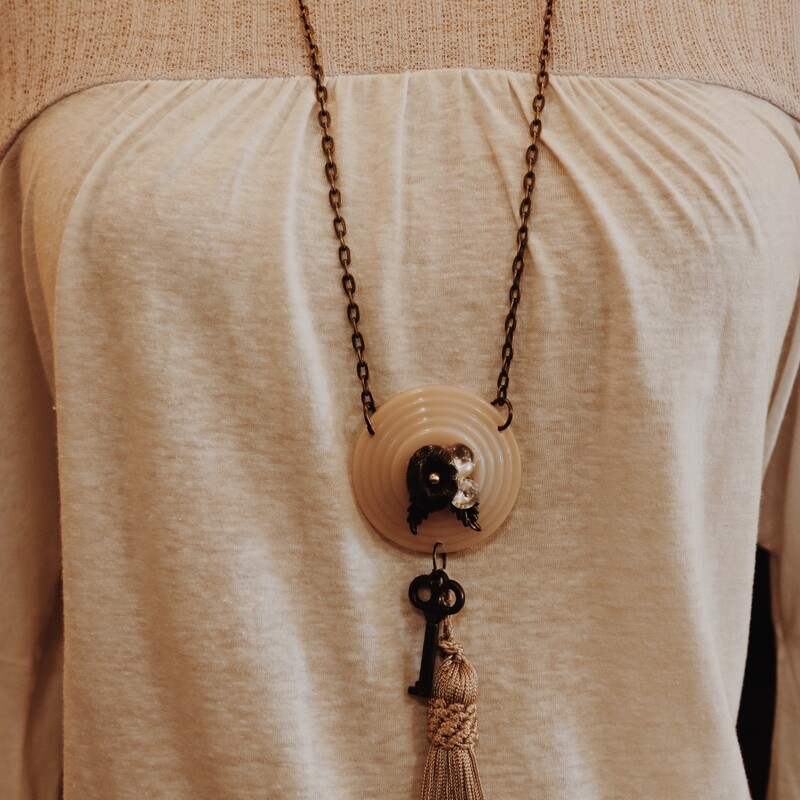 This gorgeous, handmade necklace is on a 34 inch chain!