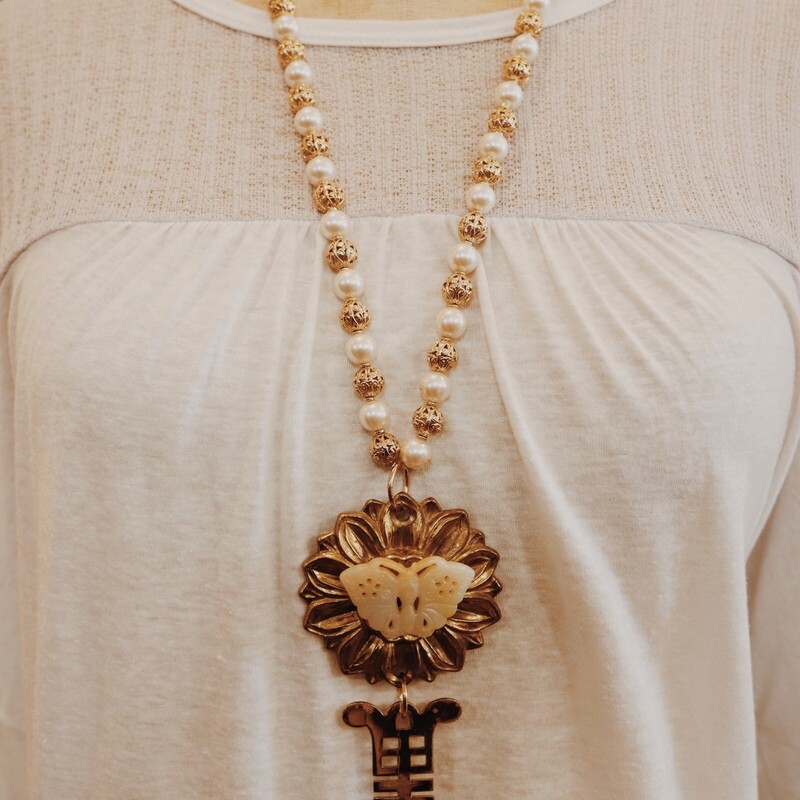 This chunky, handmade necklace is on a 30 inch chain!