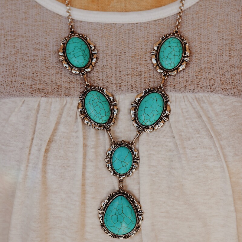 This beautiful and elegant necklace is on a 27 inch chain and has a 3 inch extender!