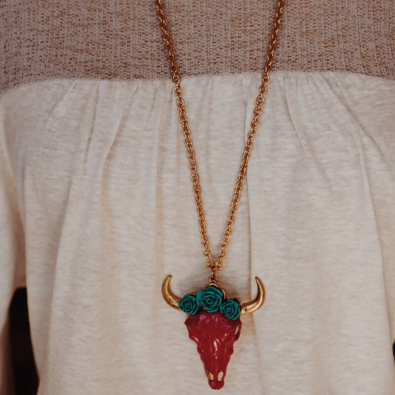 Boho Magenta Pink Cow Skull with turquoise flowers Gold Necklace. This is super cute paired with the magenta pink Beaded necklace. Sold seperately.