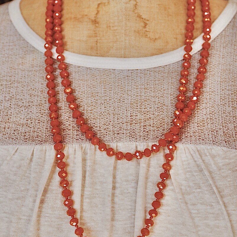 These are super cute layered with chokers or other long necklaces. This one is perfect for game day! Orange it is, beaded wrap necklace. 48 inch strand.