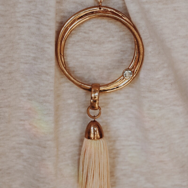 The gold on this necklace is such a beautiful, soft color! And it looks amazing paired with cream!