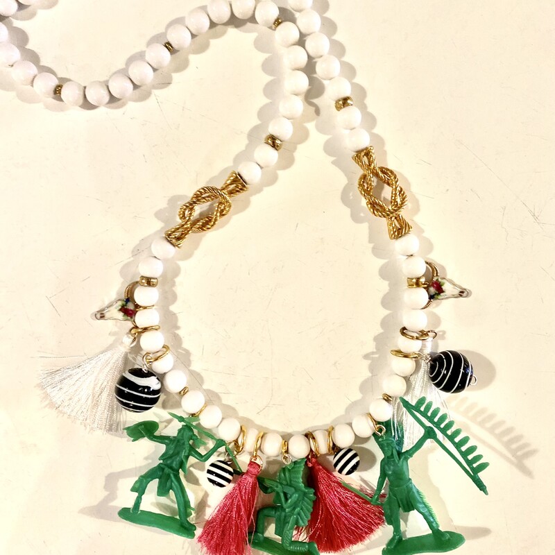 Colorful and funky handmade necklace with American Indians; tassels and more.