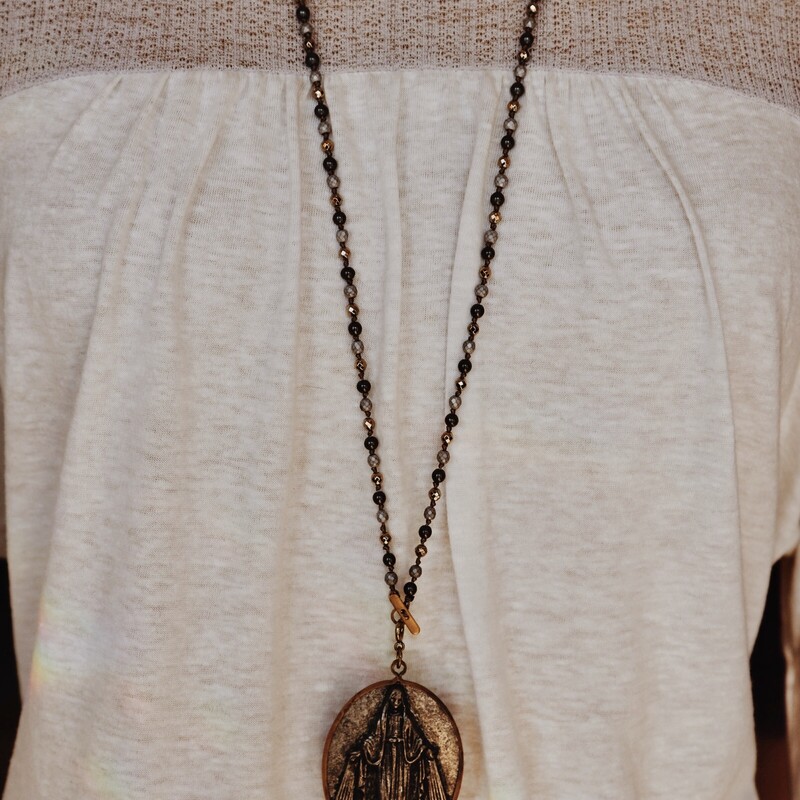 Saint Mary Pendant Necklace with gray and blue beaded 18 inch chain and 2 inch pendant.