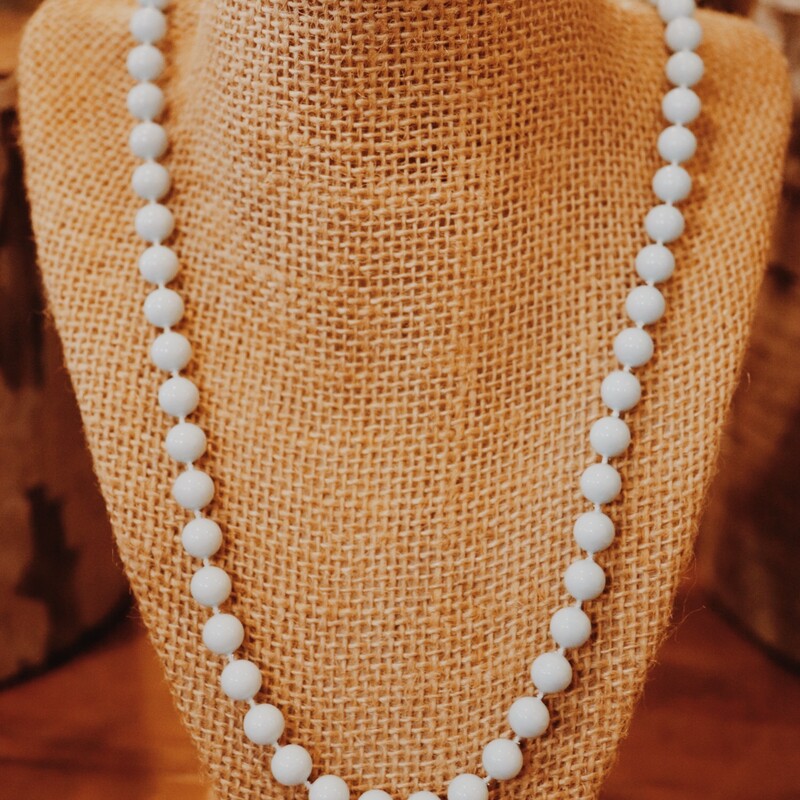 This beaded necklace comes in two sizes 8 in and 11in. The 8in necklace has beads that are a little larger than the beads on the 11 in necklace. This necklace comes in a variety of colors.