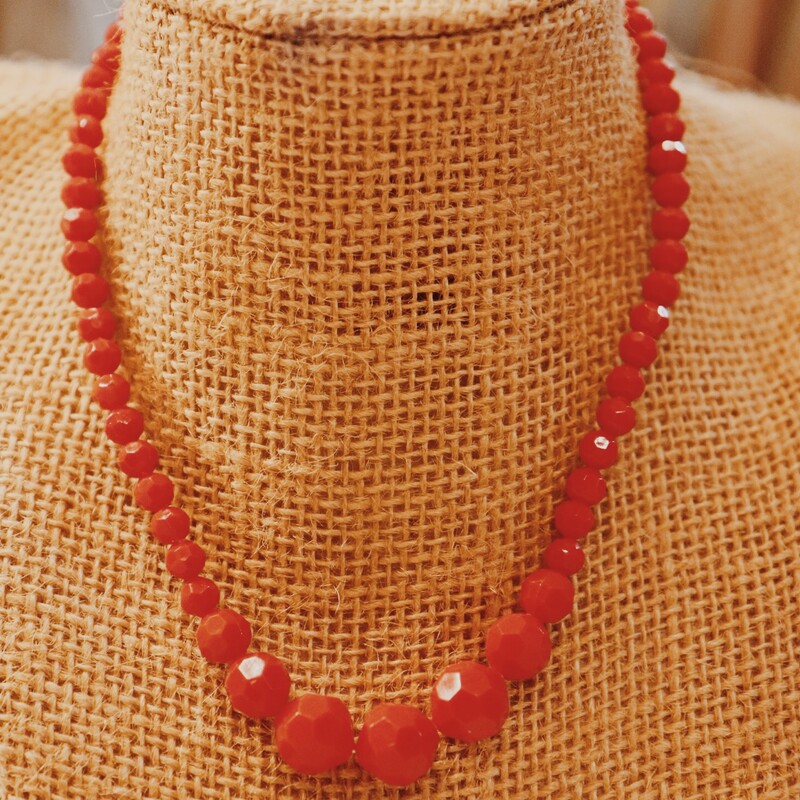 This Beaded Choker Necklace has beads covering the chain and in the center of the chain the beads are larger than the rest, It comes in a variety of colors and measures 7 inches.