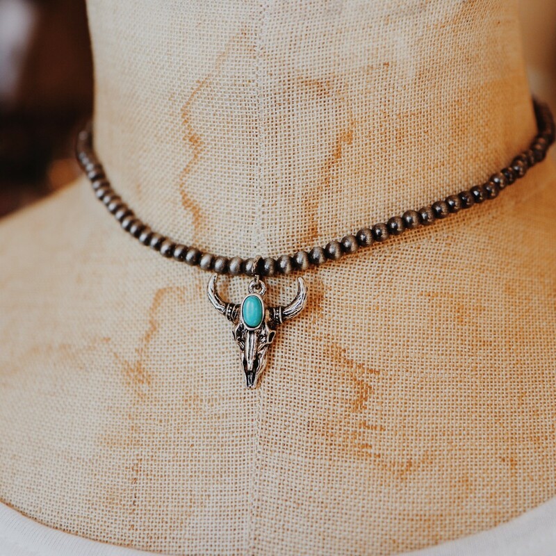 These adorable longhorn chokers with a turquoise center are on a 12 inch metal ball chain with a 3 inch extender!