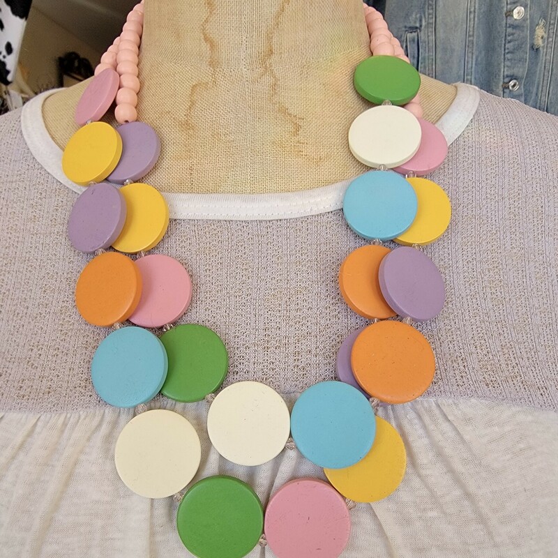 These fun and bright necklaces are absolutely adorable! They are on a 22 inch cord with a 3 inch extender.