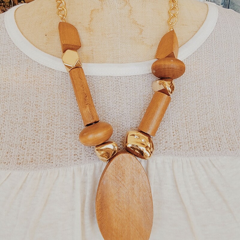 These beautiful wooden and gold necklaces are on a 22 inch chain with a 3 inch extender!