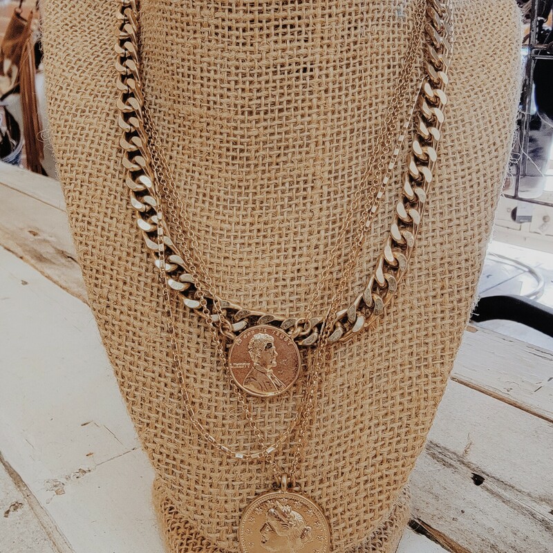 Beautiful gold colored necklace with four layers and coin pendants