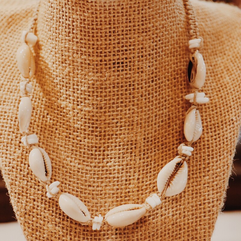 This adorable shell choker measures 18 inches long and has adjustable sizes between 15 and 18 inches!