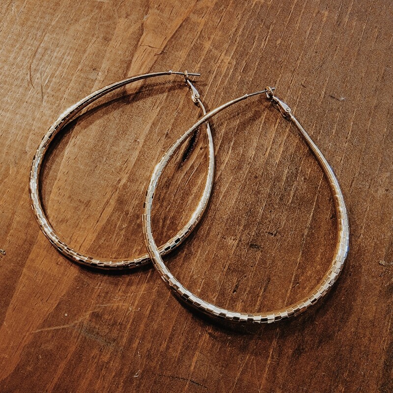 Gold hoops are an endless wardrobe stable, and you can never have too many! This teardrop shaped pair is the next one you need for your collection!