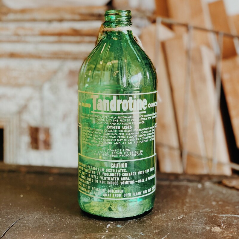 This vintage, glass Tandrotine paint thinner bottle measures 7.5 inches tall by 2.75 inches wide!