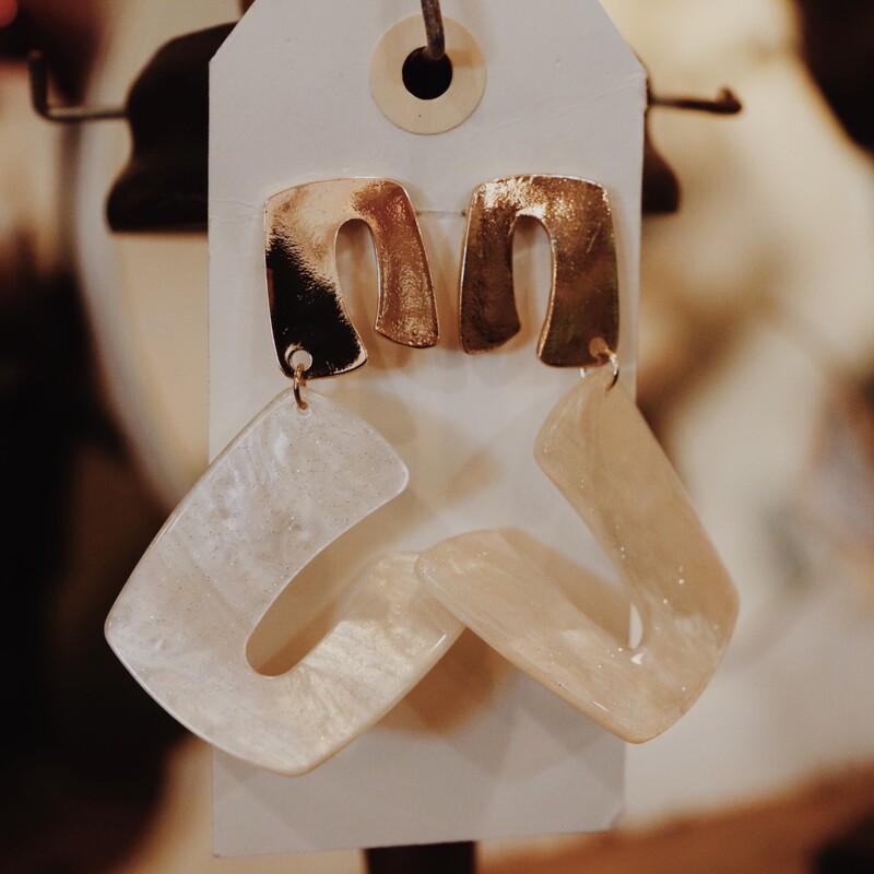 Gold And Marble Earrings, Gold plated with a marble resin dangling piece. Measures 3 inches long.