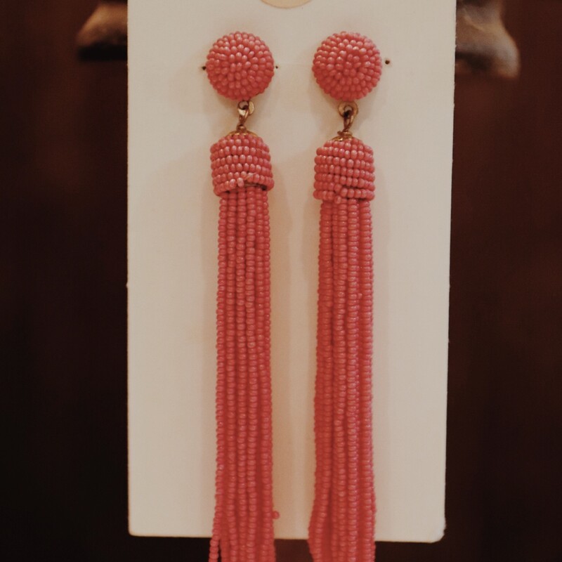 These bright pink earrings are fun and bold! They measure about 4 inches long.