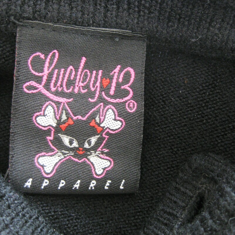 Gorgeous and ultra soft acrylic cardigan by<br />
Lucky 13<br />
black slim fit with pretty Maltese Crosses embroidered on the front.<br />
Marked size M<br />
flat measurements:<br />
shoulder to shoulder: 14.75<br />
armpit to armpit: 17.75<br />
Width at hem: 15.5<br />
underarm sleeve length: 18.5<br />
length: 21<br />
<br />
excellent condition!<br />
<br />
thanks for looking!<br />
#44704