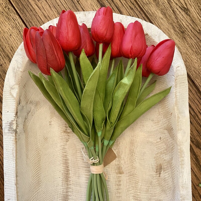 These beautiful real touch tulips are absolutely stunning! They look and feel like a real, live dozen of tulips! Use these as a gift, or fill your empty vases with a gorgeous flower that you don't have to water! They measure 14 inches long and come in a bunch of 12.